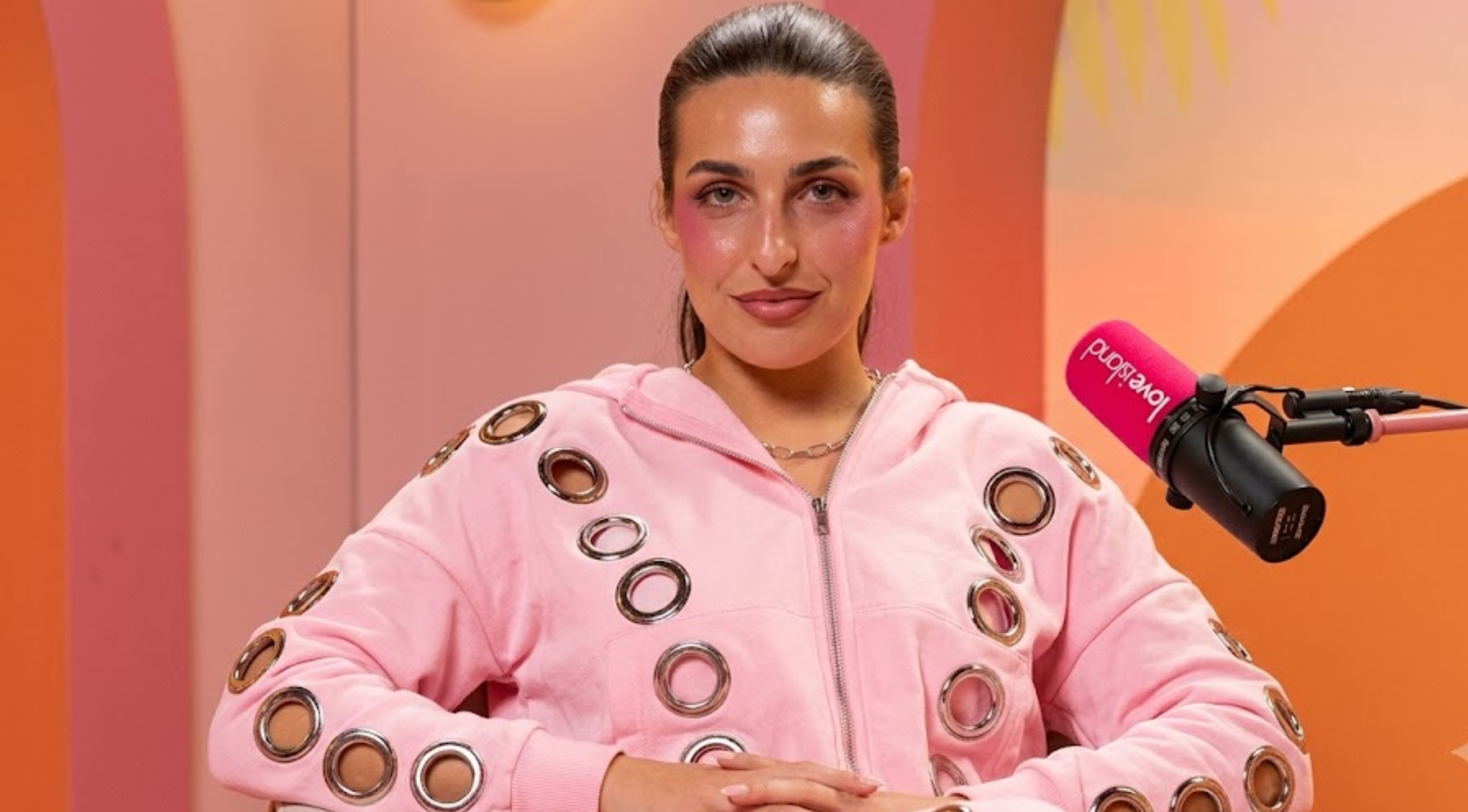 Love Island The Debrief S01 Toni Laites Pink Eyelet Zip Up Hoodie with Silver Grommets